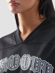Close-up of the neckline and GROOVY gothic logo on the Chrome Hearts-inspired jersey.