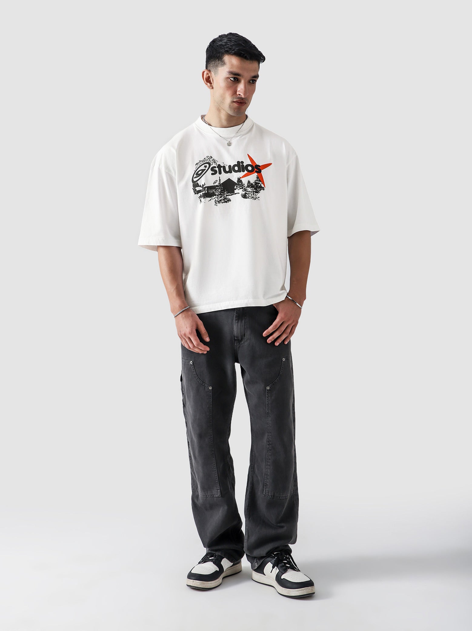 White Oversized Tee Flat Lay Product Shot – GROOVY Studios – GROOVY Pakistan