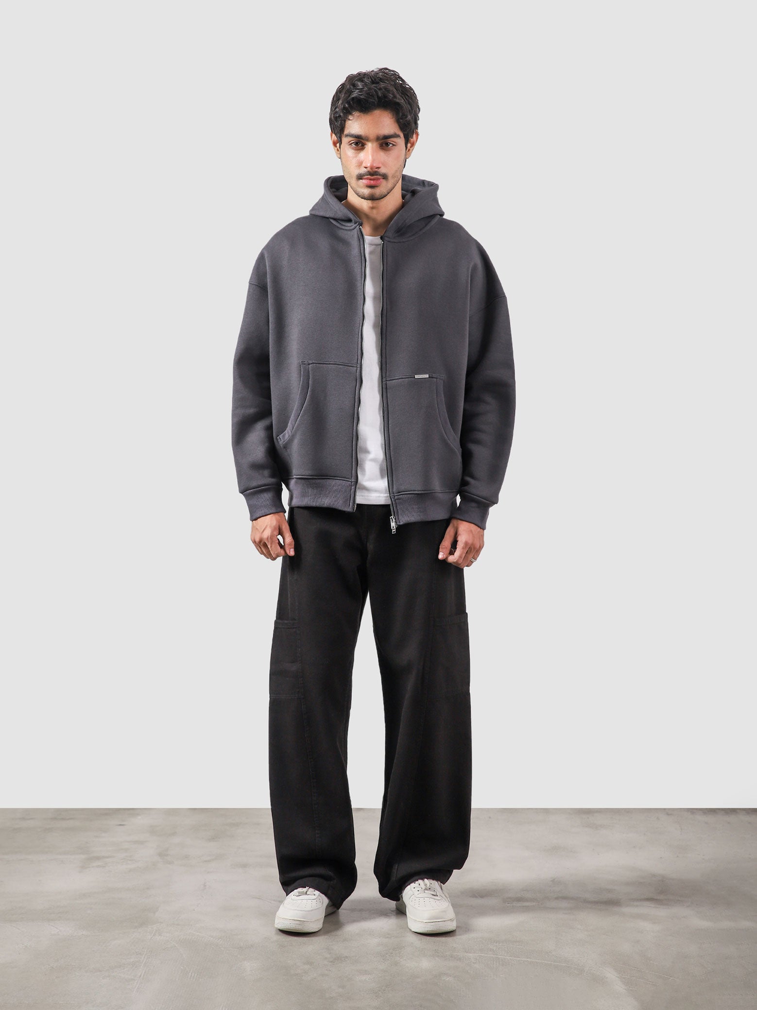 Granite essential zipper hoodie male model full body front view Pakistan – GROOVY