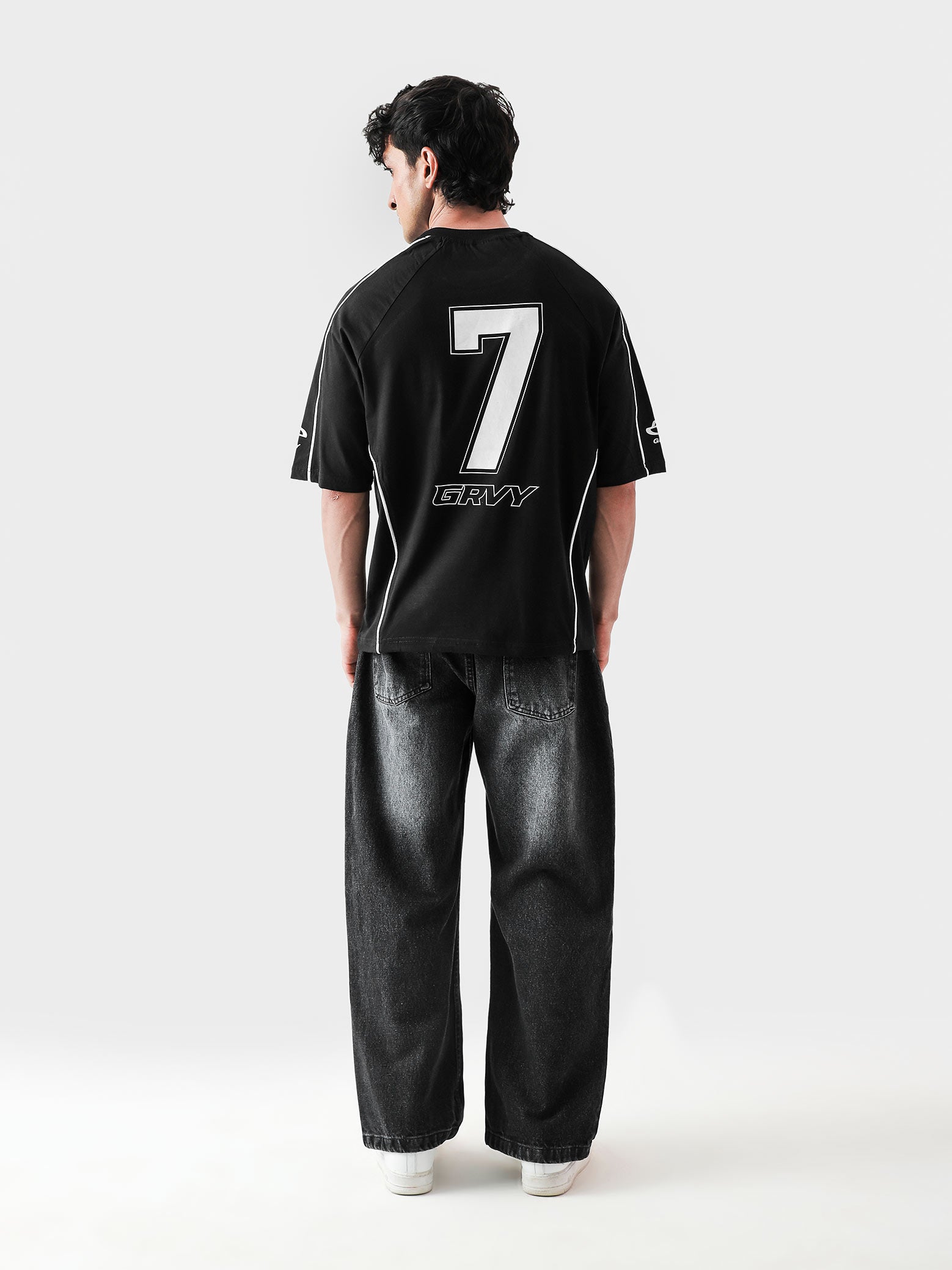 HARSH and CRUEL #7 black jersey male model full body front view piping detail Pakistan – GROOVY