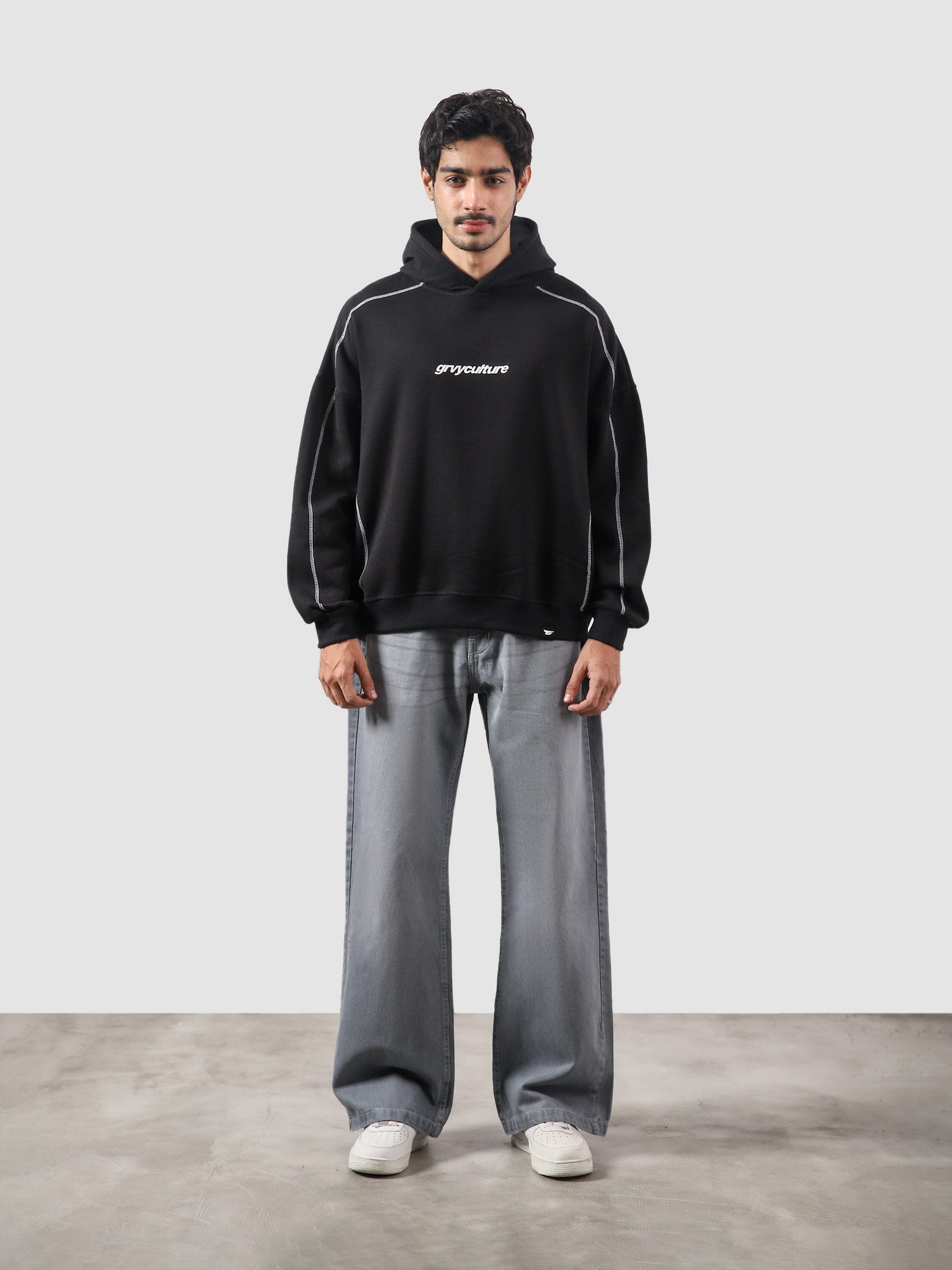 5 Way Stitch Hoodie male model full body front view structured stitching Pakistan – GROOVY