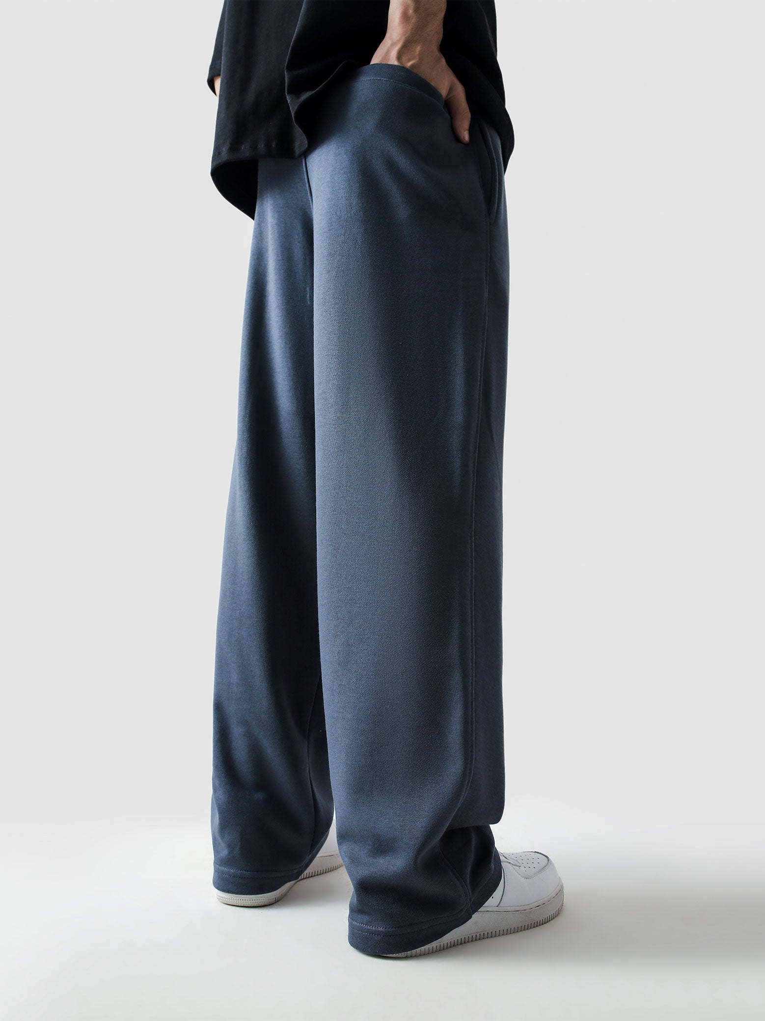 Slate blue baggy trousers male model full body front view Pakistan – GROOVY