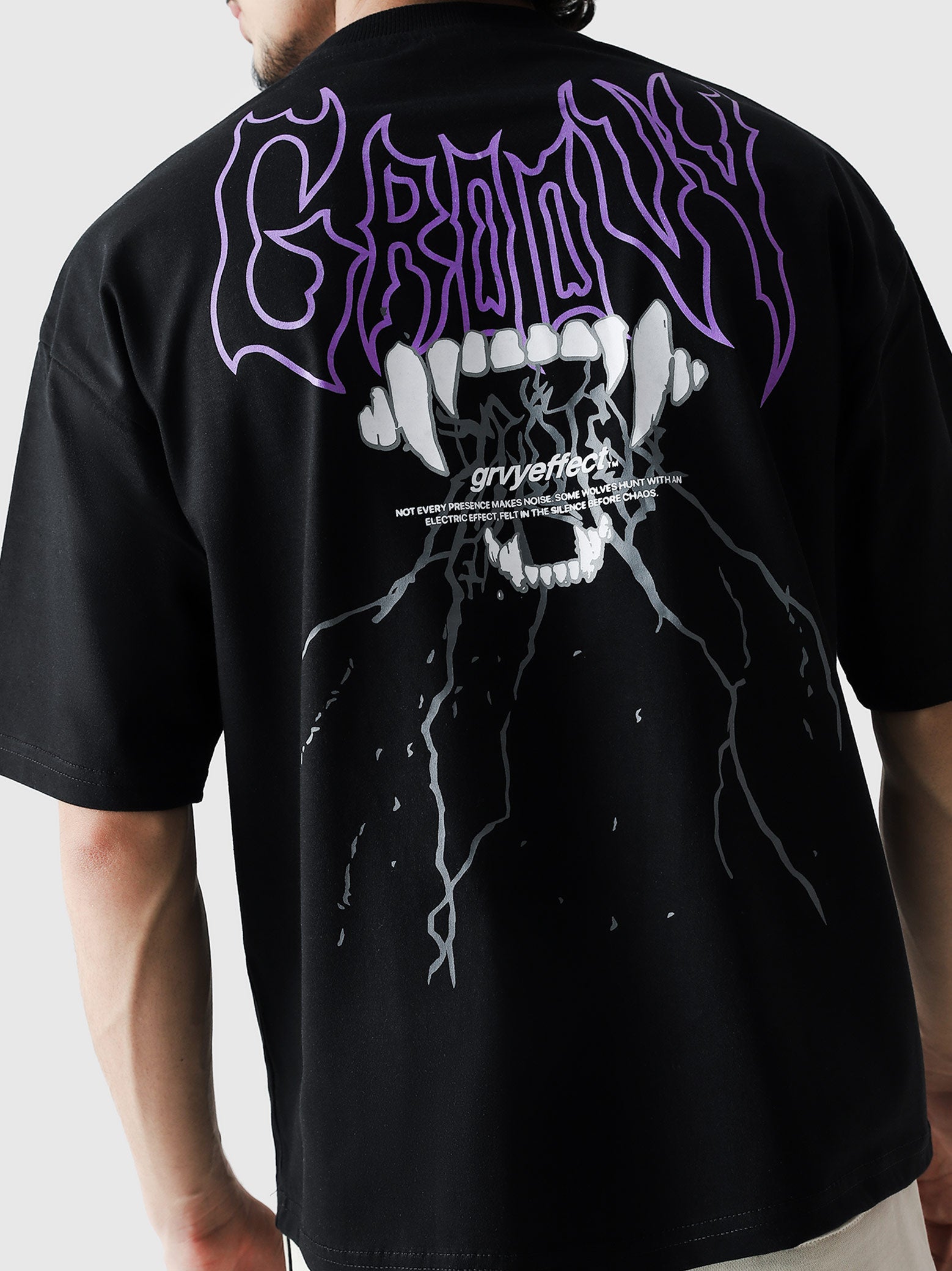 Thunder Bite Tee male model back view oversized graphic Pakistan – GROOVY GRVYEffect