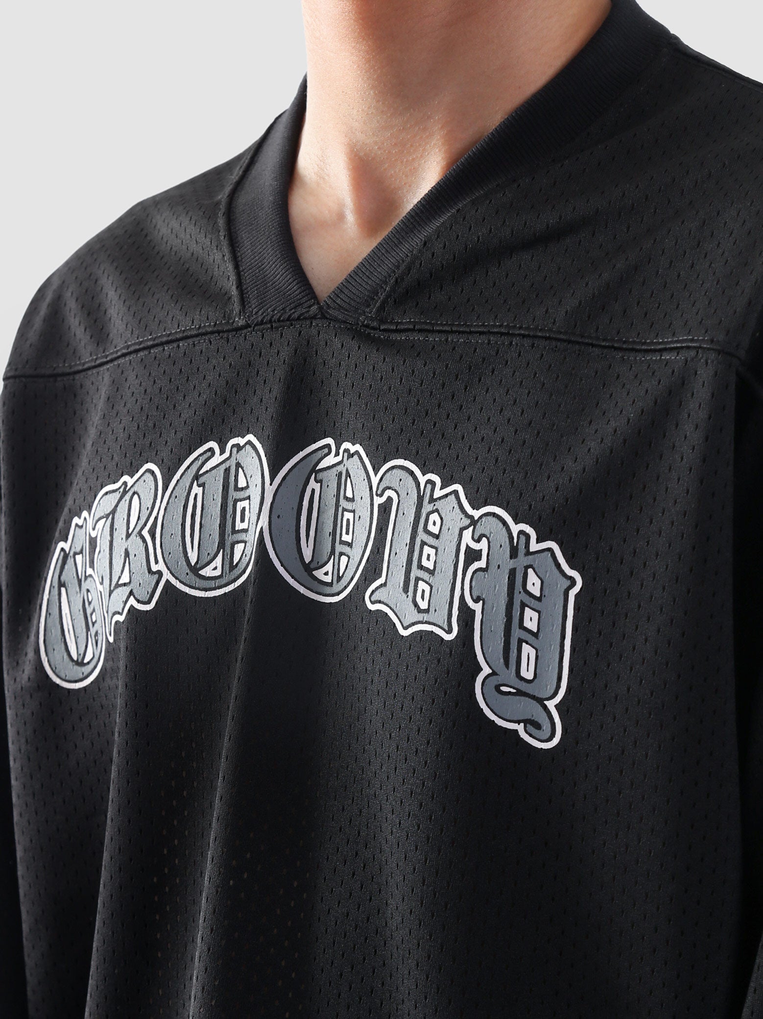Close-up of the neckline and GROOVY gothic logo on the Chrome Hearts-inspired jersey.