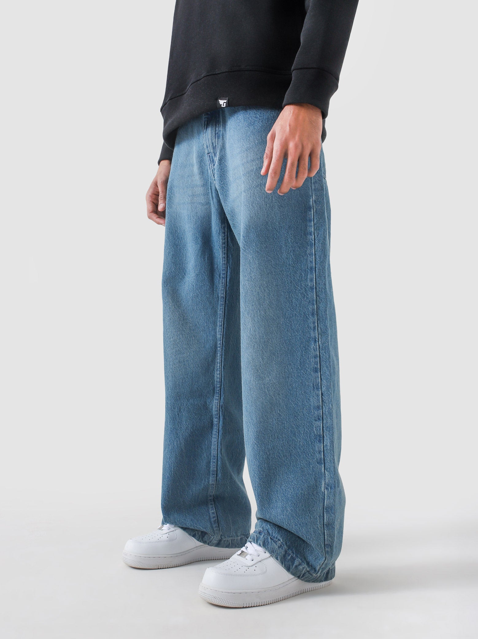 CORE denim washed blue baggy jeans male model side view full body Pakistan – GROOVY