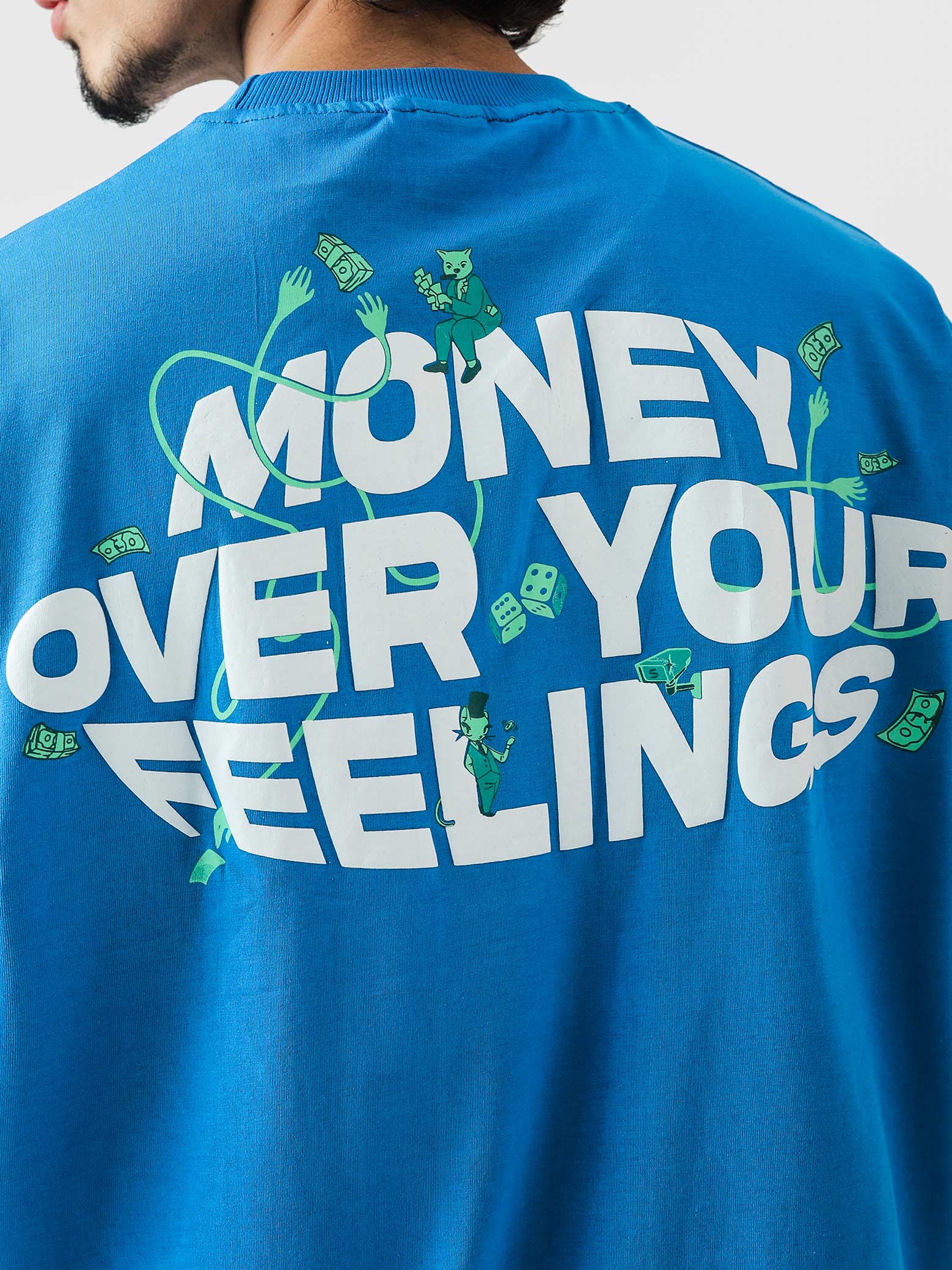 Money Over Your Feelings tee female model front view oversized blue graphic Pakistan – GROOVY