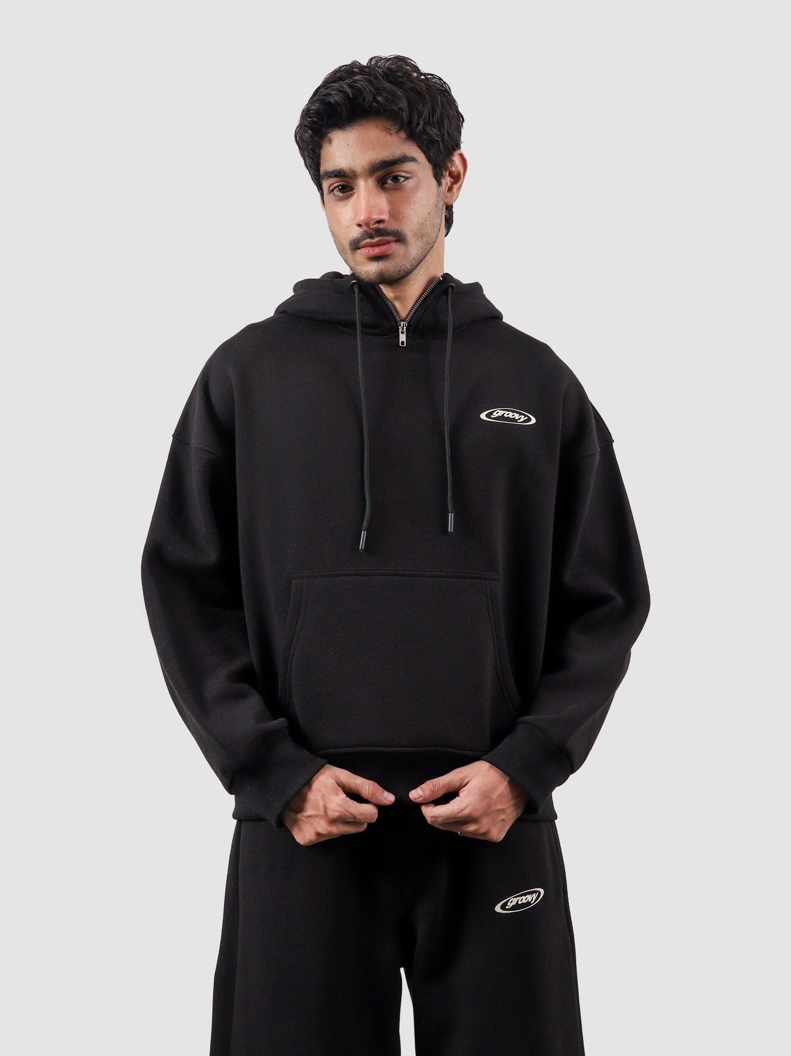 Utility Top black female model back view relaxed fit Pakistan – GROOVY