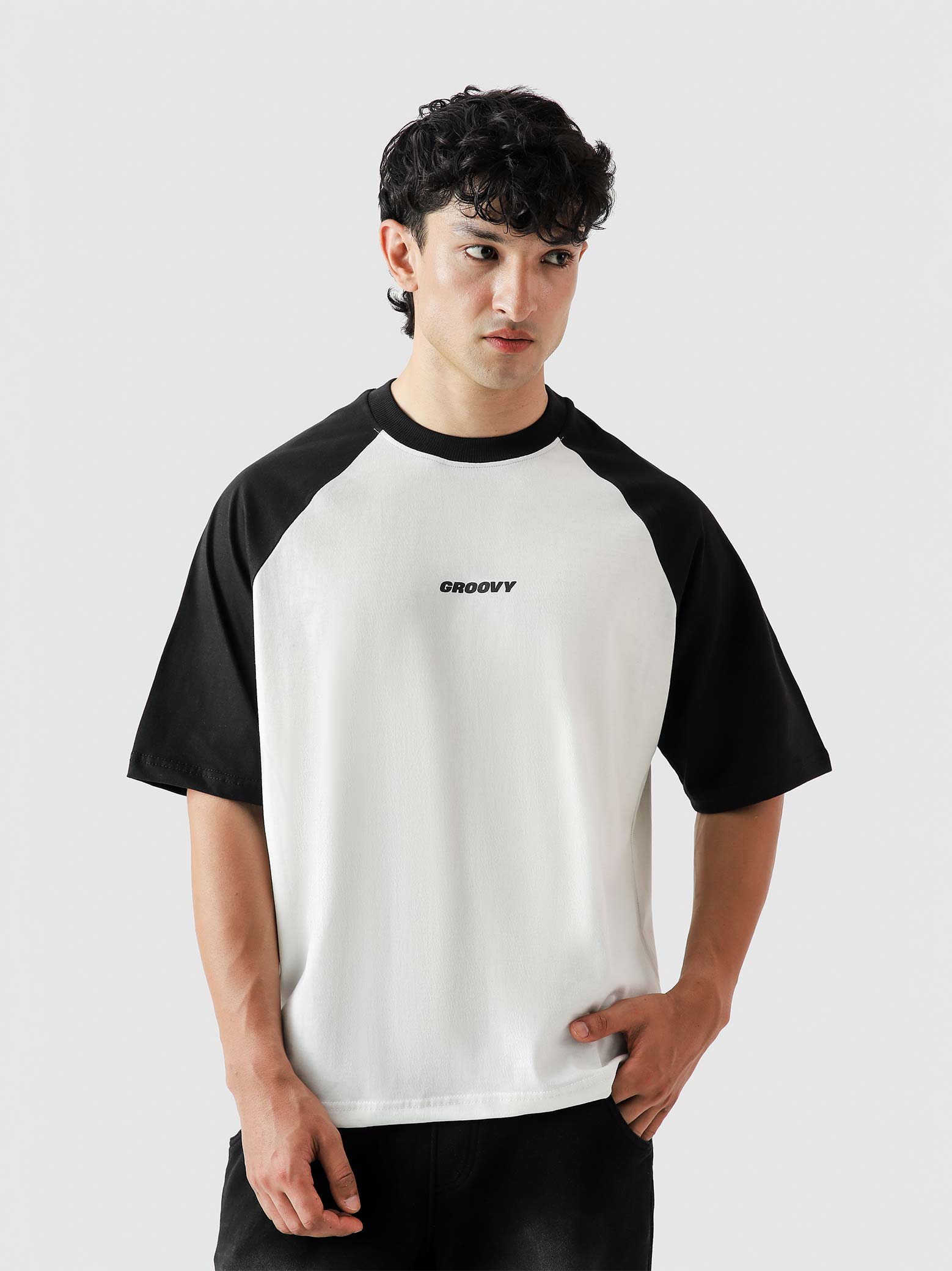 CORE tees black raglan male model side angle contrast sleeve oversized Pakistan – GROOVY