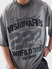 Close-up of Cultured’s “Dept. of Visionaries” oversized t-shirt featuring bold 222 World Tour graphic on oil fade washed fabric.