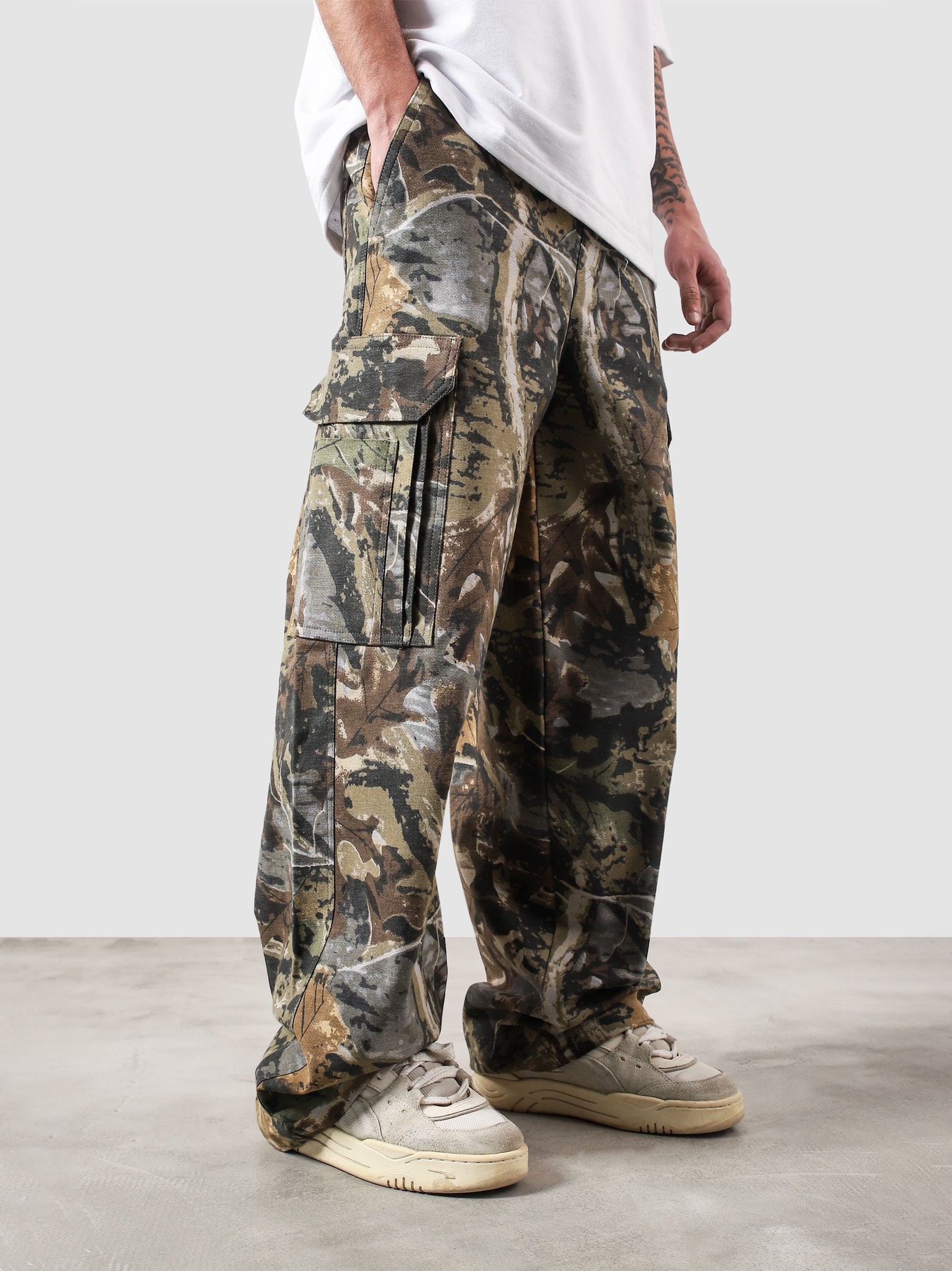 Tactical camo cargo pants couple lifestyle shot camouflage streetwear Pakistan – GROOVY