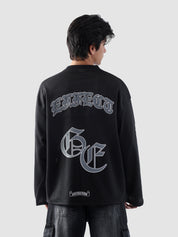 Close-up of the back gothic print text 'EFFECT' and large stylized GE lettering on GROOVY's mesh jersey.