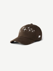 Brown cap with white patterns on a white background