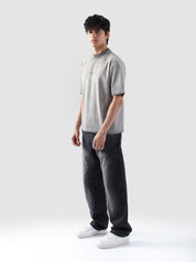 Front-facing view of the Oil Fade Blank t-shirt styled on a male model, highlighting the garment’s structured drop shoulder, relaxed silhouette, and signature faded wash.
