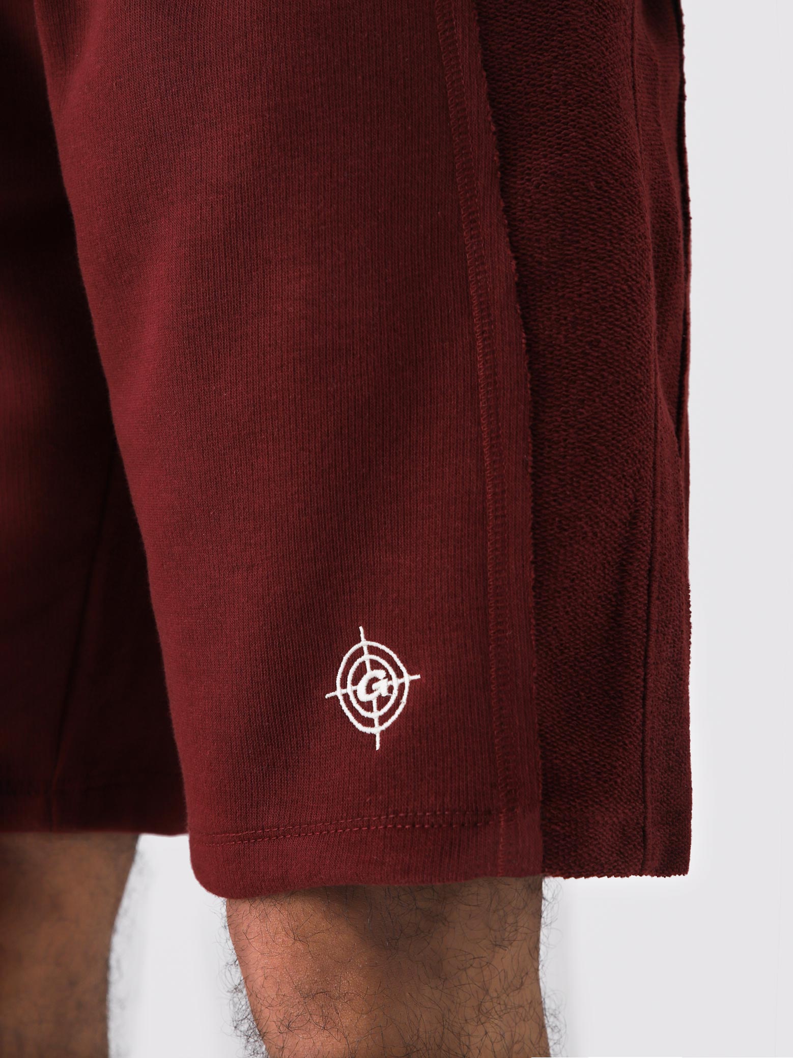 Wine Red Aim Shorts close-up, soft cotton men's everyday shorts by GROOVY Pakistan