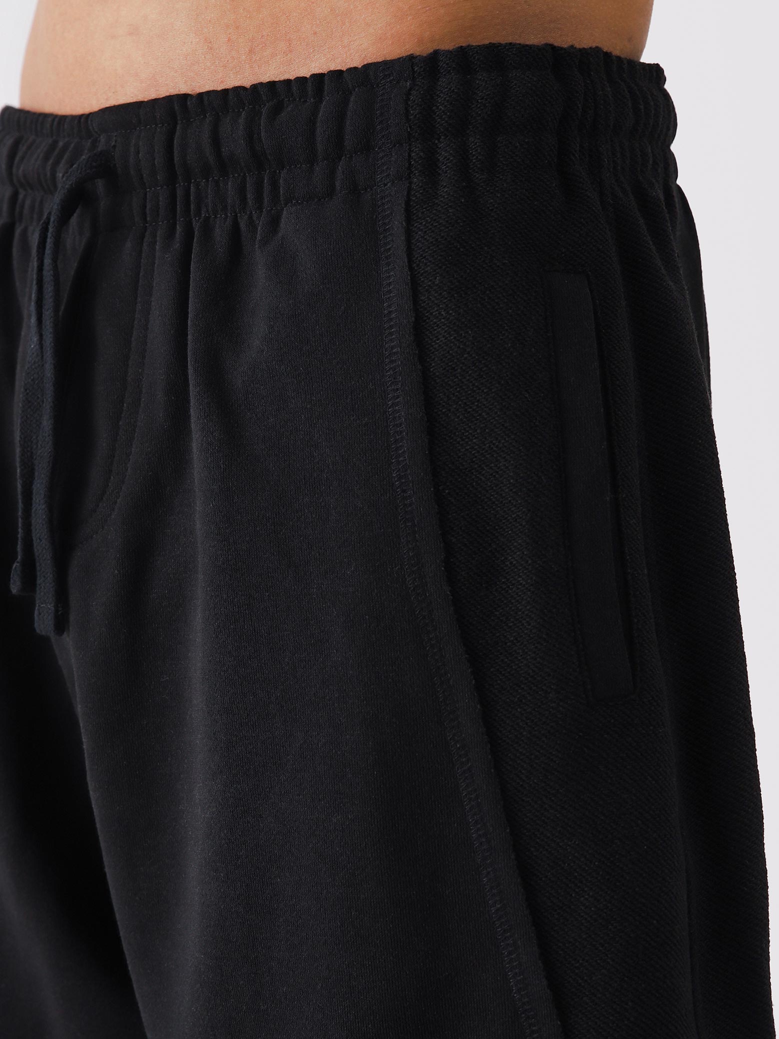 Black Aim Shorts styled for everyday wear, GROOVY men's gym and lounge shorts in Pakistan