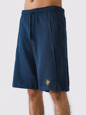 Man wearing Deep Blue Aim Shorts, GROOVY men's sport and lounge shorts, Pakistan streetwear