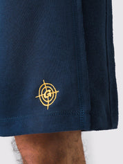 Deep Blue Aim Shorts on model, relaxed-fit men's gym and casual shorts by GROOVY Pakistan