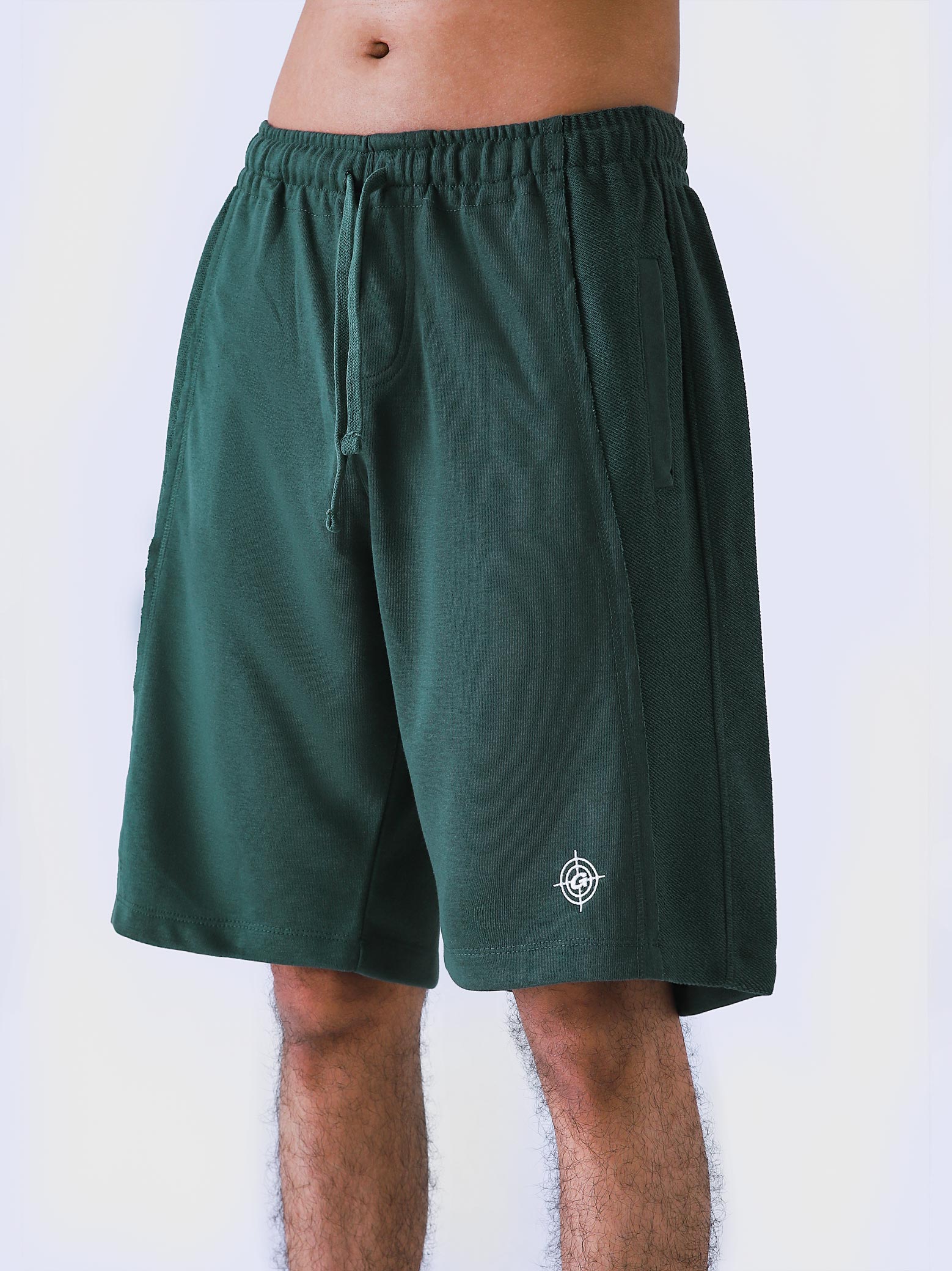 Deep Green Aim Shorts by GROOVY, soft lightweight men's gym and everyday shorts in Pakistan