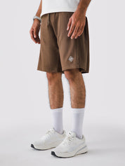Man wearing Chocolate Brown Aim Shorts, GROOVY men's sport and lounge shorts, Pakistan streetwear