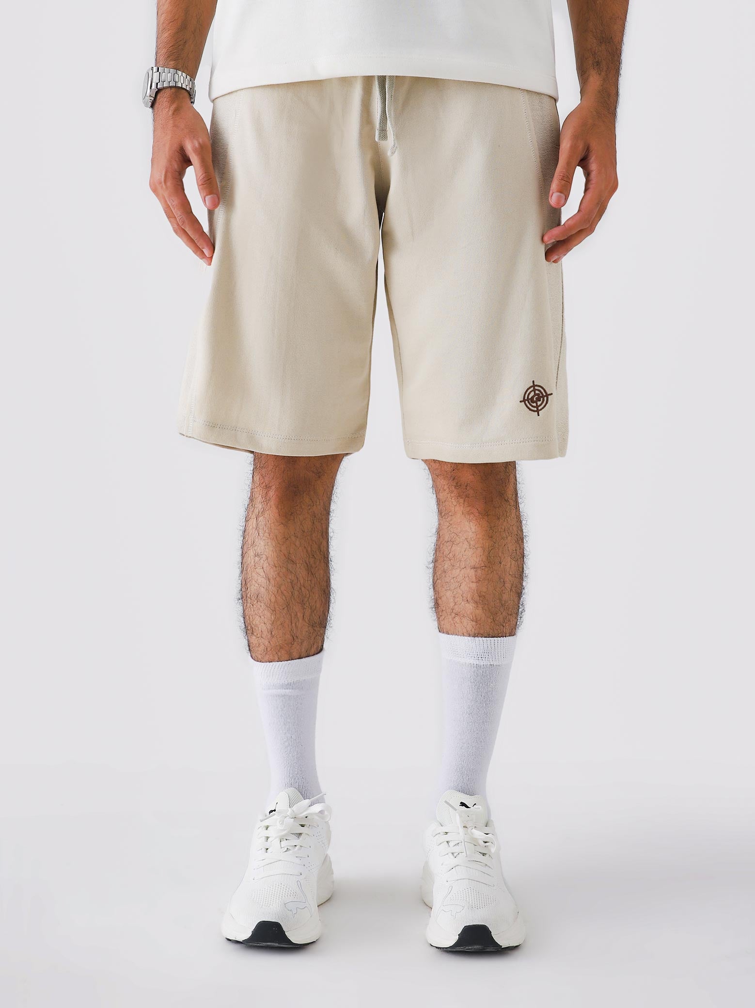 Man wearing Cream Aim Shorts, GROOVY men's sport and lounge shorts, Pakistan streetwear