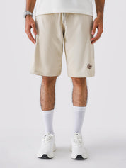 Man wearing Cream Aim Shorts, GROOVY men's sport and lounge shorts, Pakistan streetwear