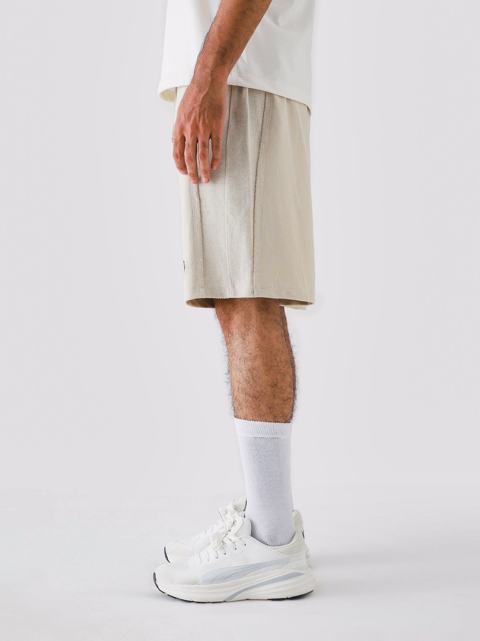 Cream Aim Shorts for men, breathable summer shorts for gym and daily wear by GROOVY Pakistan