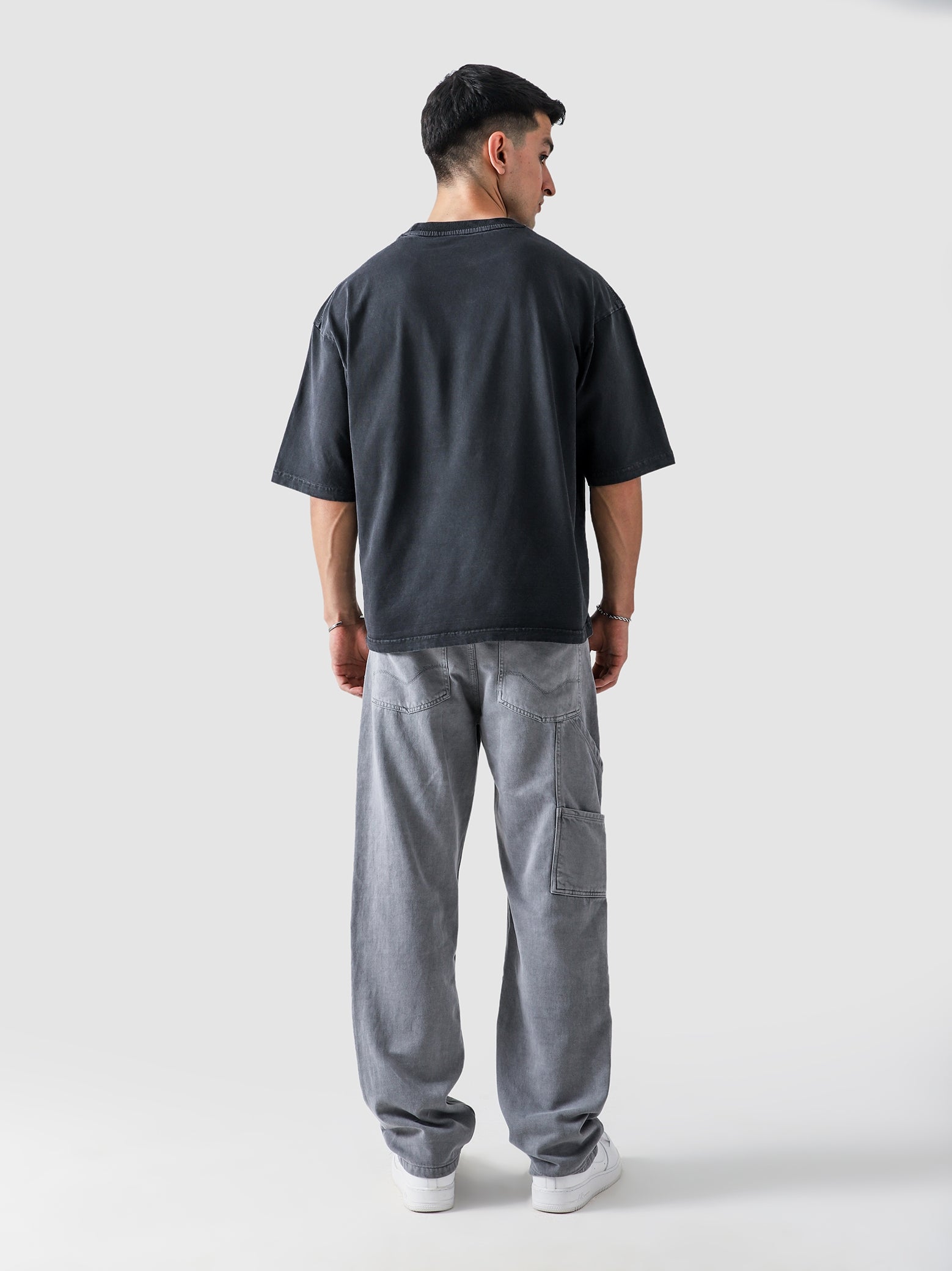 Metallica washed grey t-shirt female model back view oversized Pakistan – GROOVY