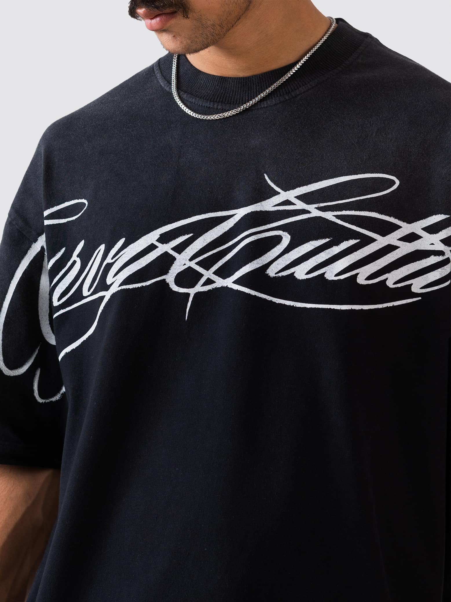 GROOVY Pakistan t-shirt, fade-washed black, script graphic print