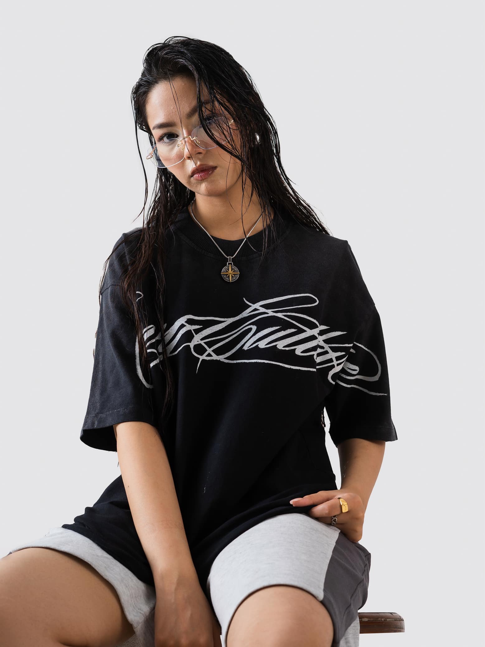 fade-washed black t-shirt by GROOVY, script graphic print, Pakistan