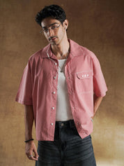 Puff embroidered GrvyStudios script across the back of a red gingham shirt - GROOVY Pakistan
