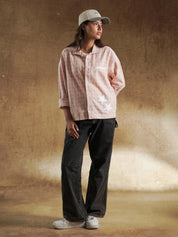 Plaid shirt worn open over a cream tee - GROOVY Pakistan