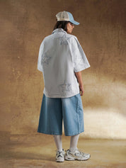 Contrast stitching along the placket of a grey denim shirt - GROOVY Pakistan