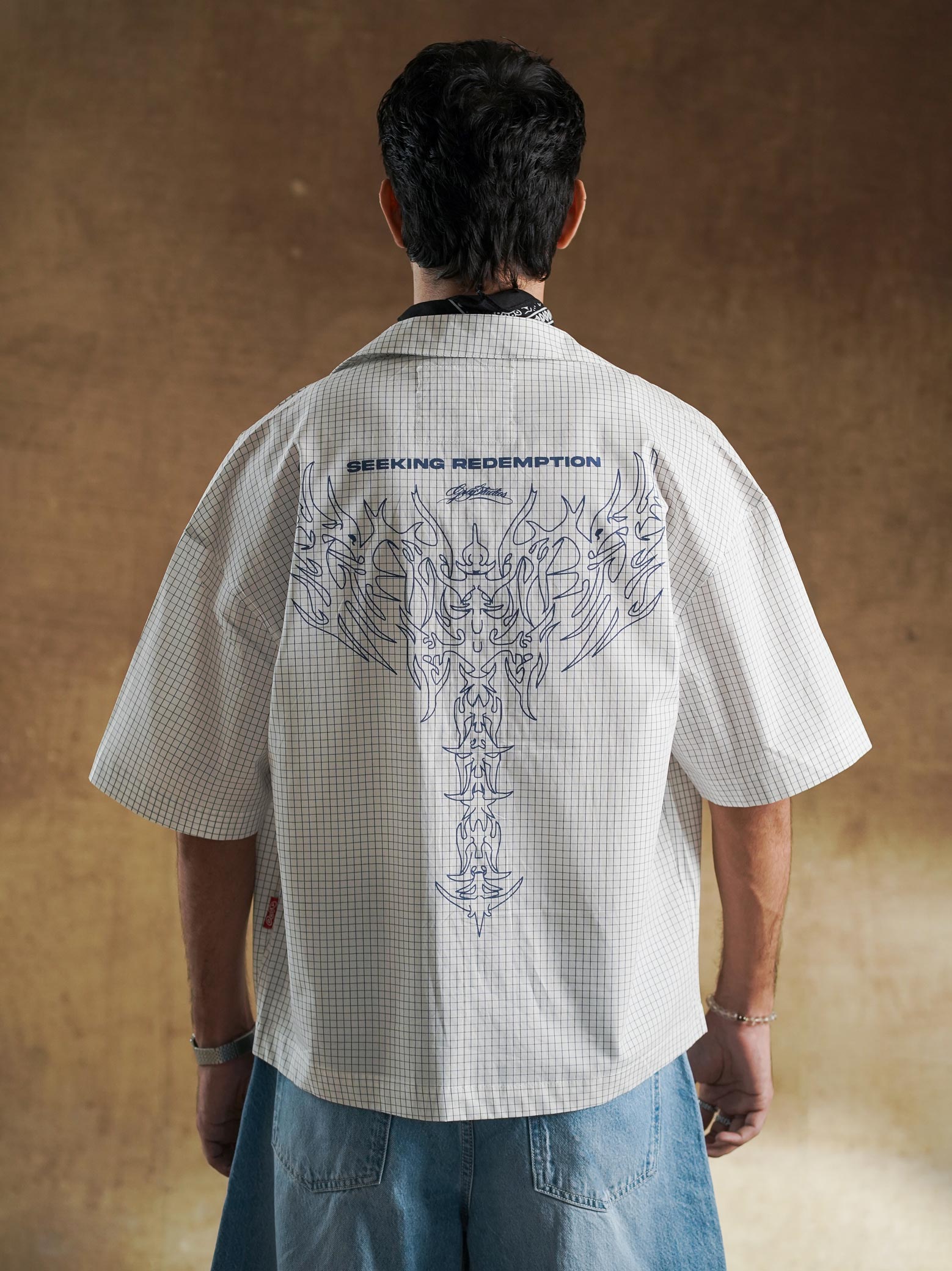 Navy linework print close up on cream shirting - GROOVY Pakistan