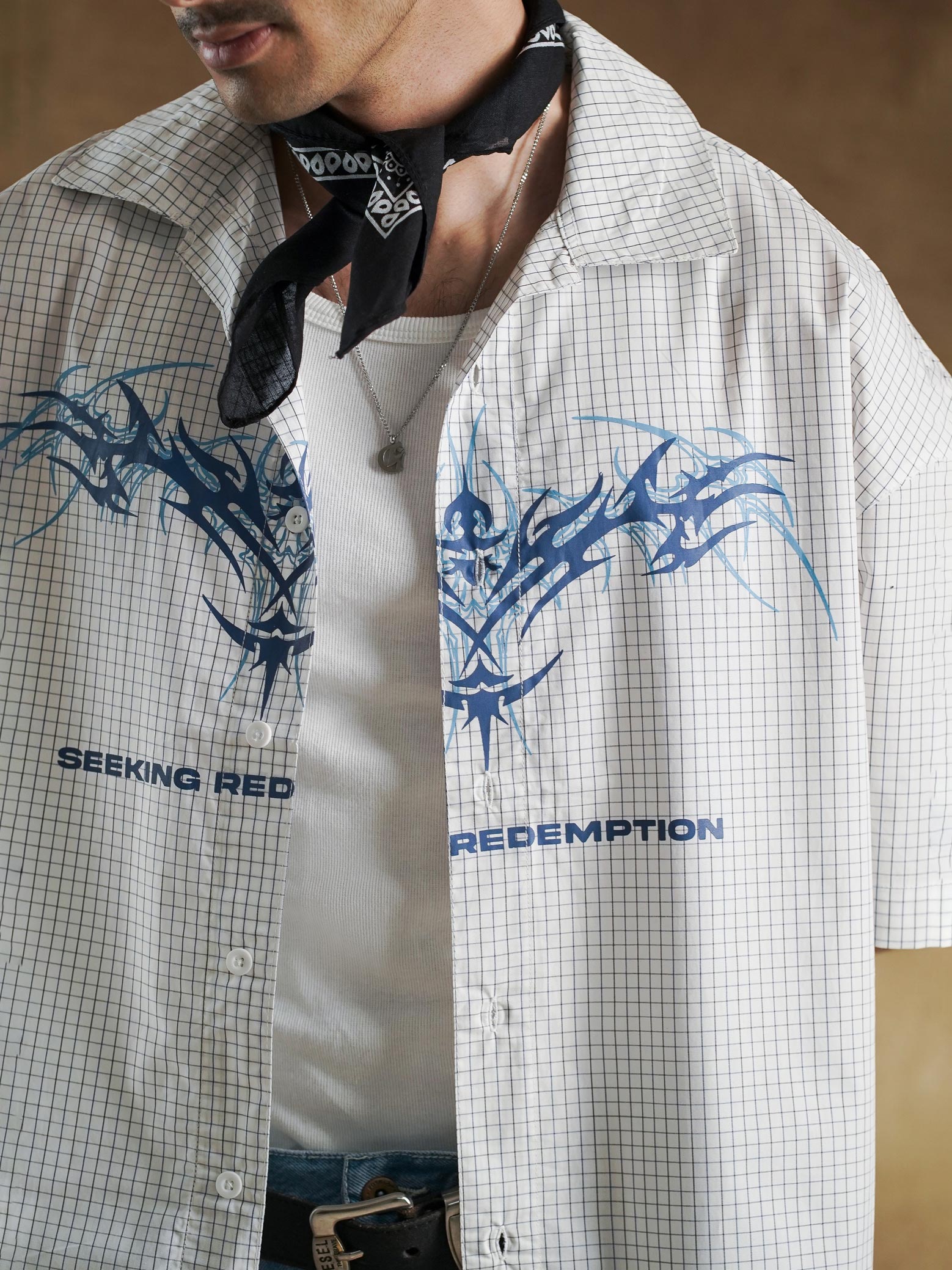 Half sleeve and shoulder drop on woven check shirt - GROOVY Pakistan