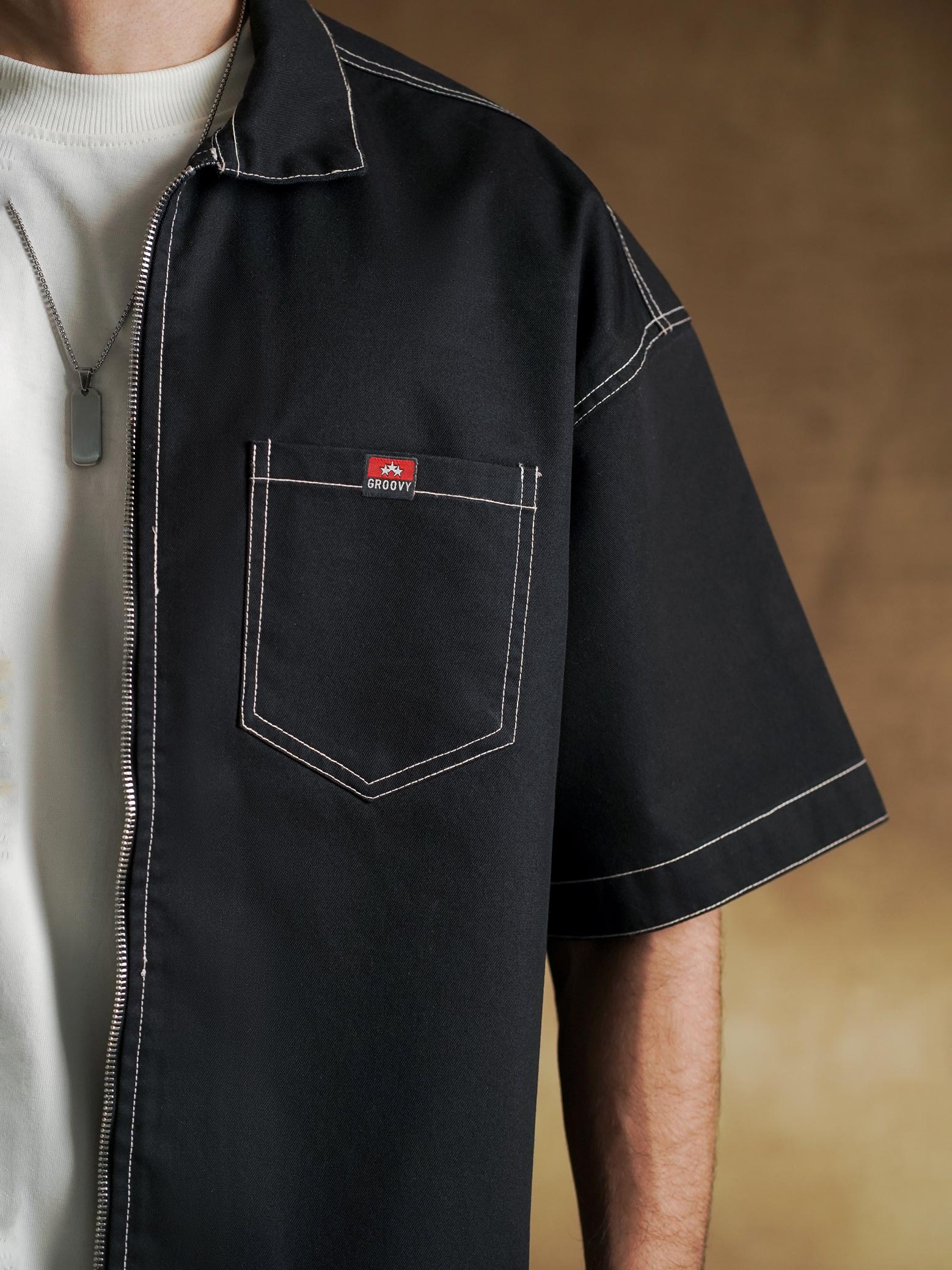 Twin patch pockets on black zip front shirt - GROOVY Pakistan