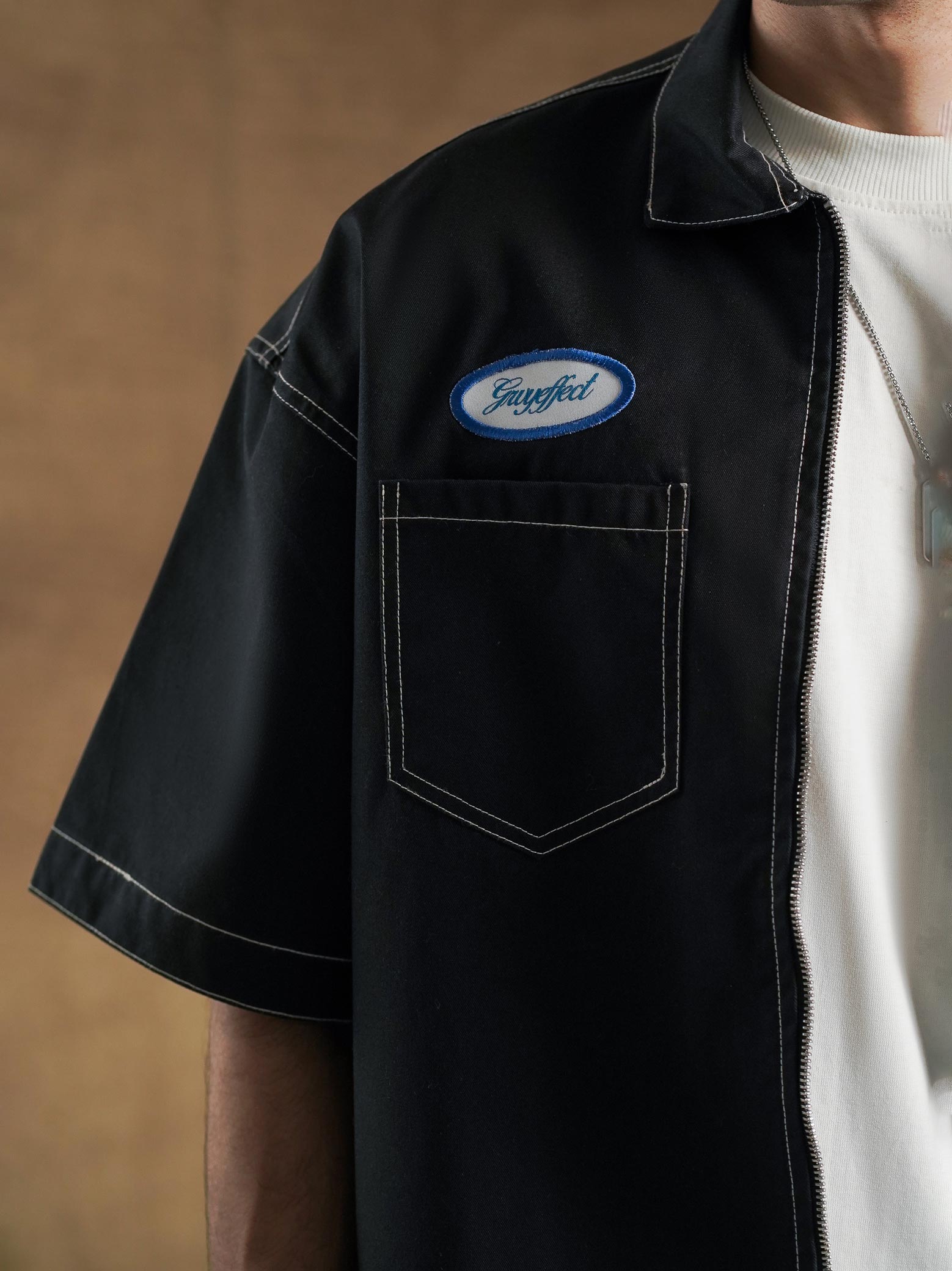 Contrast white topstitching on black cotton twill shirt - GROOVY Pakistan
