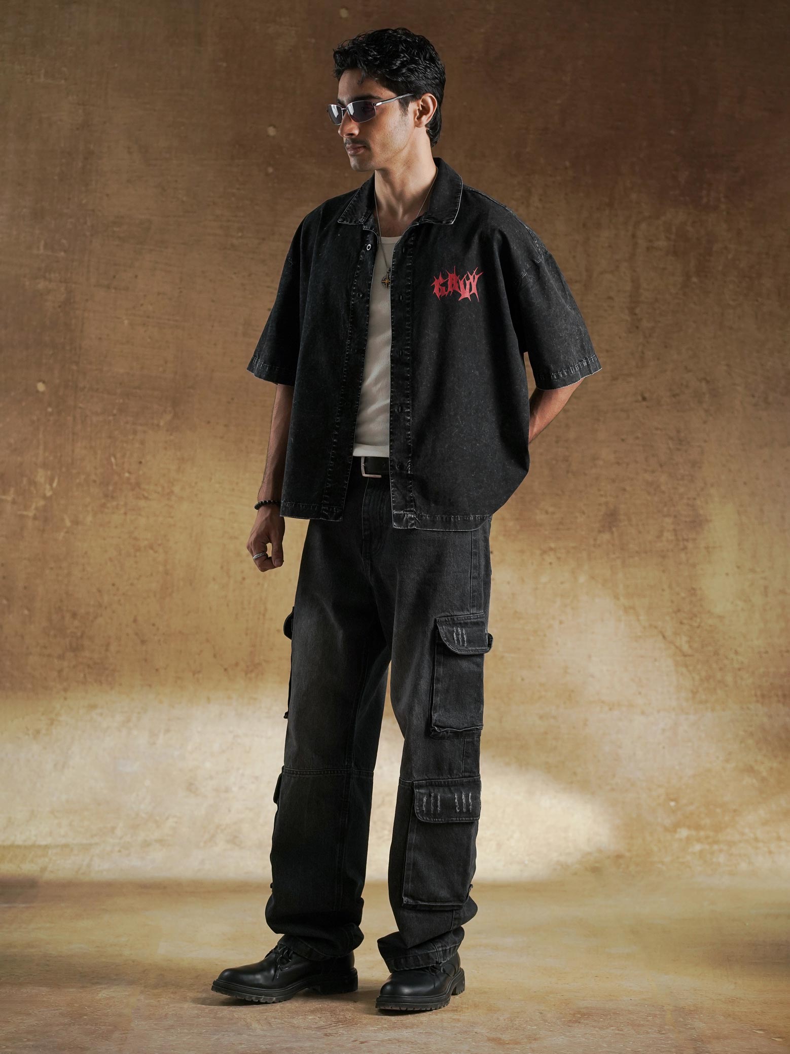 Back view of oversized acid wash shirt on model - GROOVY Pakistan