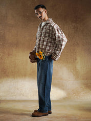 Chest pocket construction on plaid button up - GROOVY Pakistan