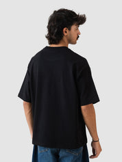 black oversized t-shirt by GROOVY Pakistan, embroidered logo