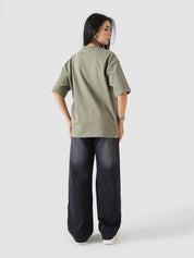 muted olive oversized t-shirt from GROOVY, embroidered logo, made in Pakistan